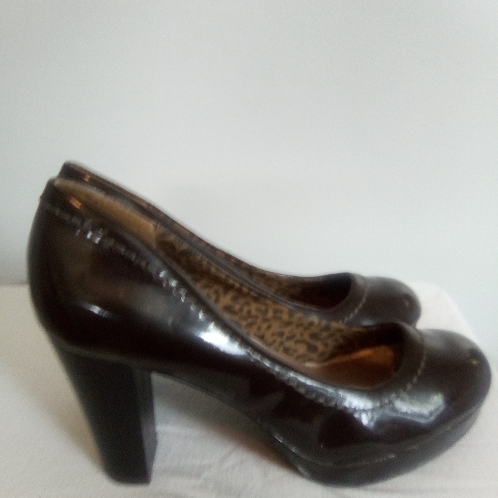 Dark brown shoes.